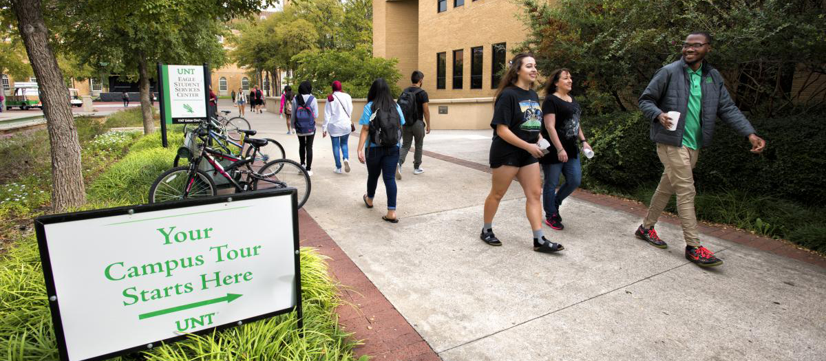 Students walking near the Eagle Student Services Center